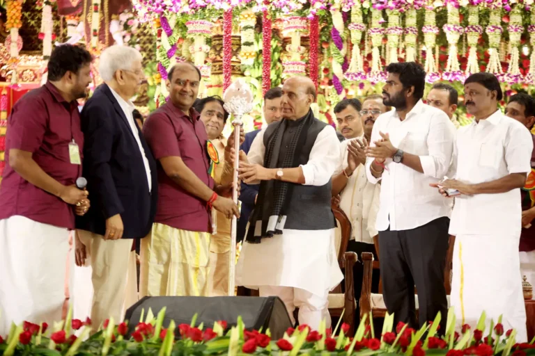 IMPA organizers presenting Silver Vel to Defence Minister Thiru Rajnath Singh in the presence of spiritual leaders and Athinams.