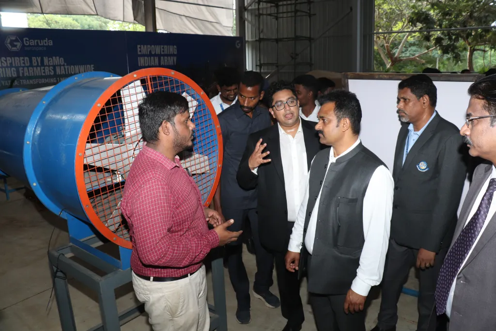 Shri Kamlesh Paswan reviewing the testing setup and equipment at the Garuda Indigenization Facility.