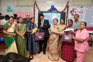 Rotary members and healthcare staff distribute maternity kits to new mothers during World Breastfeeding Week 2025 at a government hospital in Chennai.