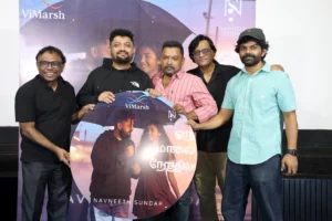 Composer Navneeth Sundar with team at the preview launch of Oru Maalai Nerathil, unveiling the AI-powered multilingual music video poster.