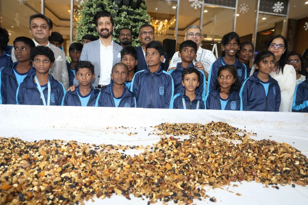 Children from the community join Grand Chennai by GRT Hotels’ Christmas Cake Mixing Ceremony, celebrating the festive spirit with guests and hotel representatives.