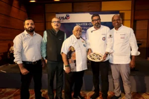 Raj Sethia, Raj Kapoor, Chef Damodaran, Chef Sheetharam, and another event representative at the USA Blueberries Master Class in Chennai, with Chef Raj Sethia holding a blueberry dish