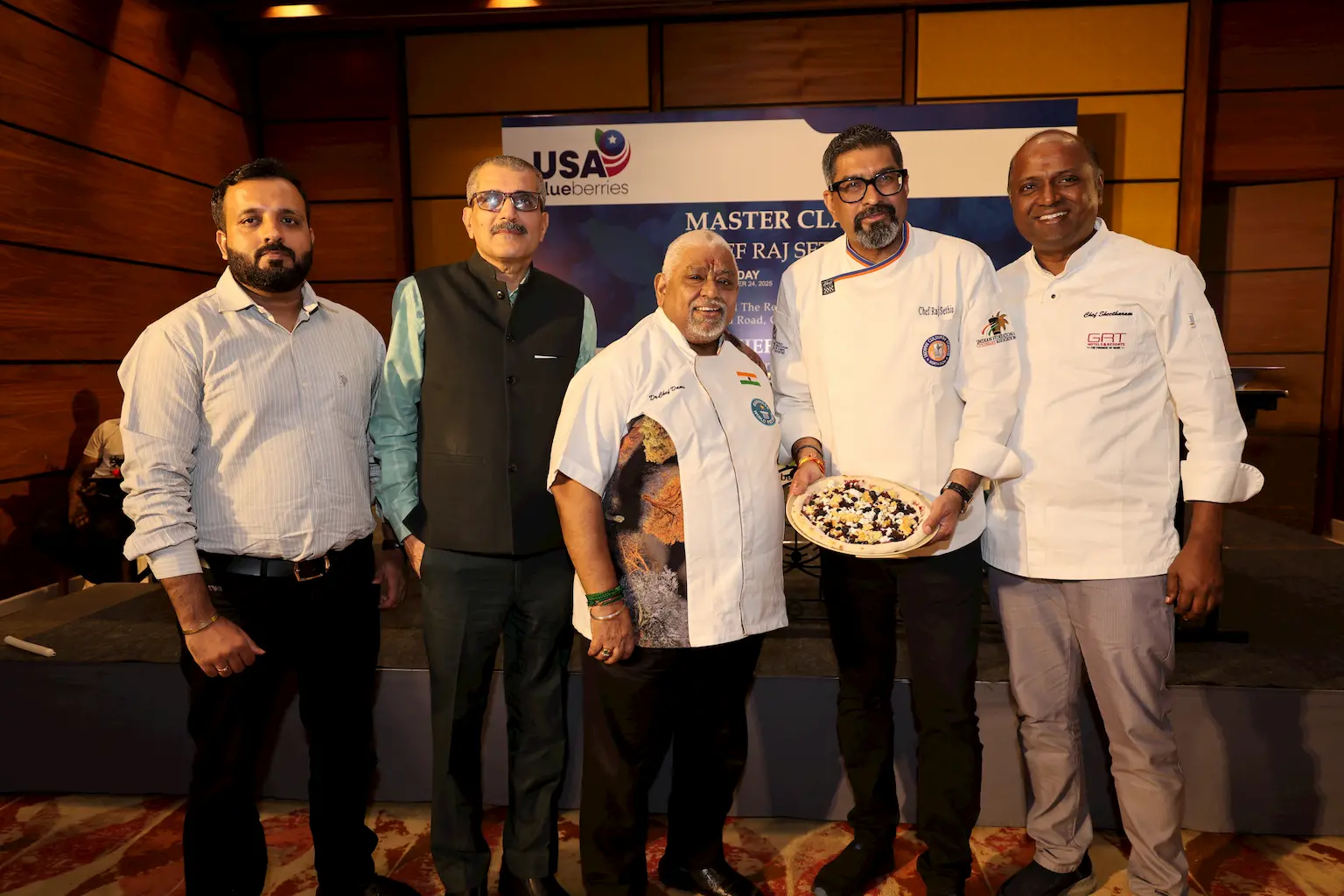 Raj Sethia, Raj Kapoor, Chef Damodaran, Chef Sheetharam, and another event representative at the USA Blueberries Master Class in Chennai, with Chef Raj Sethia holding a blueberry dish