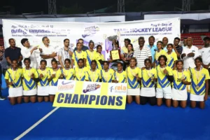 SRM Institute of Science and Technology women's team receiving Champions Trophy at THL 2026 women's final